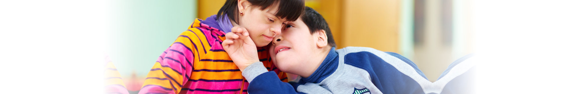 a kid showing love to his friend